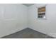 Small bedroom with carpeted floor and window at 519 S Mulberry St, Cherryville, NC 28021