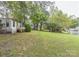 Mobile home with a large grassy backyard at 519 S Mulberry St, Cherryville, NC 28021
