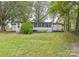 Mobile home with screened porch and yard at 519 S Mulberry St, Cherryville, NC 28021