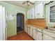 Kitchen with vintage cabinetry and appliances. Needs renovation at 519 S Mulberry St, Cherryville, NC 28021