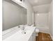 Bathroom with a shower/tub combo and double vanity at 3903 Planters Watch Dr, Charlotte, NC 28278