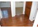 Hardwood floors in the hallway with access to kitchen and other rooms at 2124 W Main St # C, Albemarle, NC 28001