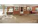 Covered carport with access to house and side porch at 2124 W Main St # C, Albemarle, NC 28001