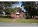 Brick house with mature trees and landscaping at 2124 W Main St # C, Albemarle, NC 28001