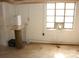 Unfinished basement with dehumidifier and window at 2124 W Main St # C, Albemarle, NC 28001