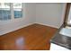 Bright bedroom with hardwood floors and large window at 2124 W Main St # C, Albemarle, NC 28001