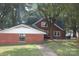 Brick house with detached brick building and yard at 2124 W Main St # C, Albemarle, NC 28001
