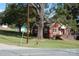 Brick house with large tree and fire hydrant at 2124 W Main St # C, Albemarle, NC 28001