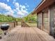 Large deck overlooking the backyard, complete with a grill at 10510 Hartsell Rd, Midland, NC 28107