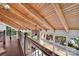 Open upper hallway with wood floors and a view of the living room at 19010 Kailua Cir, Tega Cay, SC 29708