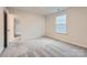 Bright bedroom featuring carpet and a window at 4445 Dusty Orchard Rd, Kannapolis, NC 28081