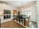 Bright kitchen features stainless steel appliances and an eat-in area at 540 Kenway Loop, Mooresville, NC 28117