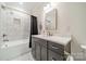 Clean bathroom with a double vanity and bathtub at 540 Kenway Loop, Mooresville, NC 28117