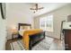 Cozy bedroom with a queen-size bed and large windows at 540 Kenway Loop, Mooresville, NC 28117