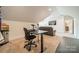 Home office in bonus room with standing desk at 540 Kenway Loop, Mooresville, NC 28117