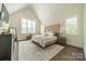 Spacious primary bedroom with a large bed and plenty of natural light at 540 Kenway Loop, Mooresville, NC 28117