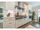 Modern kitchen features stainless steel appliances and white shaker cabinets at 540 Kenway Loop, Mooresville, NC 28117