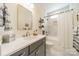 Clean bathroom with a tub shower combo and updated vanity at 540 Kenway Loop, Mooresville, NC 28117