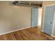 Simple bedroom with light walls and wood-look flooring at 145 33Rd Sw St, Hickory, NC 28602