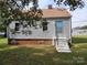 Gray siding house with steps and yard at 145 33Rd Sw St, Hickory, NC 28602