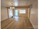 Light filled living room, hardwood floors, fireplace at 145 33Rd Sw St, Hickory, NC 28602