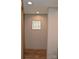 Small hallway with vinyl flooring and a window at 961 Myers Mill Rd, Olin, NC 28660