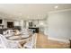 Bright dining area with a round wooden table and white chairs, adjacent to the kitchen at 1001 E 22Nd St, Kannapolis, NC 28083