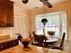 Cozy kitchen nook with a window overlooking the backyard at 701 Whippoorwill Ln, Concord, NC 28025