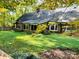 House with a sunroom and large backyard at 701 Whippoorwill Ln, Concord, NC 28025