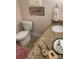 Small bathroom with granite countertop and toilet at 701 Whippoorwill Ln, Concord, NC 28025