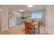 Charming kitchen and dining area with wood flooring at 1011 Elm St, Albemarle, NC 28001