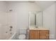 Simple bathroom with shower/tub combo and vanity at 108 Cottonwood Dr, Mount Holly, NC 28120