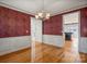 Spacious dining room with hardwood floors and views into the kitchen at 108 Cottonwood Dr, Mount Holly, NC 28120