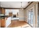 Charming dining room with hardwood floors and sliding glass doors at 108 Cottonwood Dr, Mount Holly, NC 28120