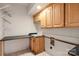 Laundry room with washer and dryer hookups and cabinets at 108 Cottonwood Dr, Mount Holly, NC 28120