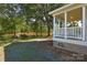 Home's exterior with a porch overlooking a tranquil waterfront at 455 Playground Ln # 6, Salisbury, NC 28146