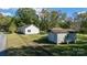 View of property with home, shed, and trampoline at 455 Playground Ln # 6, Salisbury, NC 28146