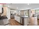 Modern kitchen with island, stainless steel appliances, and granite countertops at 504 Zermatt Ct, Monroe, NC 28112