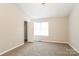 Bedroom with closet and window, vaulted ceiling at 10443 Brawley Ln, Charlotte, NC 28215