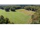 Aerial view of farmland with home and outbuildings; ideal for horses at 405 Brown Rd, York, SC 29745