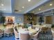 Community dining area with multiple tables and chairs at 12821 Mayes Rd, Huntersville, NC 28078
