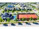 Aerial view of community amenities including tennis court, shuffleboard, and clubhouse at 12821 Mayes Rd, Huntersville, NC 28078