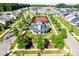 Aerial view of community tennis court and clubhouse at 12821 Mayes Rd, Huntersville, NC 28078