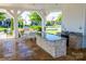 Outdoor kitchen area with granite countertop and stainless steel appliances at 12821 Mayes Rd, Huntersville, NC 28078