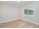 Bright bedroom with hardwood floors and large window offering a view of the surrounding landscape at 1336 Sage Pine Cir # 21, Clover, SC 29710