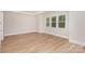 Bright bedroom with hardwood floors and large windows offering natural light at 1336 Sage Pine Cir # 21, Clover, SC 29710