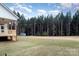 Large backyard with grassy area and tree line for privacy at 1336 Sage Pine Cir # 21, Clover, SC 29710