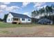 House exterior showcasing a white exterior and backyard at 1336 Sage Pine Cir # 21, Clover, SC 29710