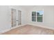Bright office with hardwood floors, French doors, and a large window at 1336 Sage Pine Cir # 21, Clover, SC 29710