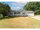 Gray siding one-story house with attached garage and front porch at 119 Bluff Ct, Statesville, NC 28625